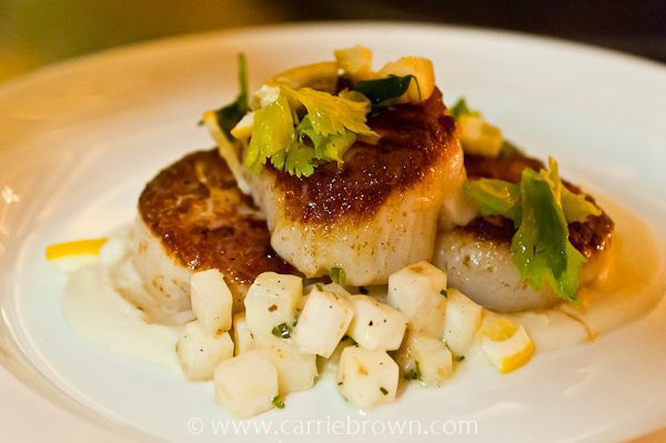 SEARED SEA SCALLOPS seared in brown butter with caramelized cauliflower, cauliflower puree, pickled sultanas and fried capers